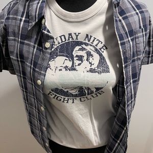 Tee shirt and button down- tee shirt says “Friday nite fight club”.